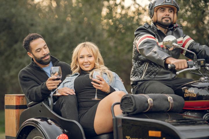 a person riding on the back of a motorcycle