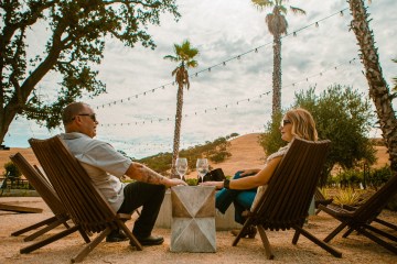 a couple enjoying wine tasting in Paso Robles