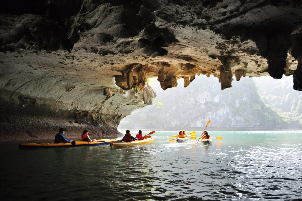 a group of people kayaking on the central coast