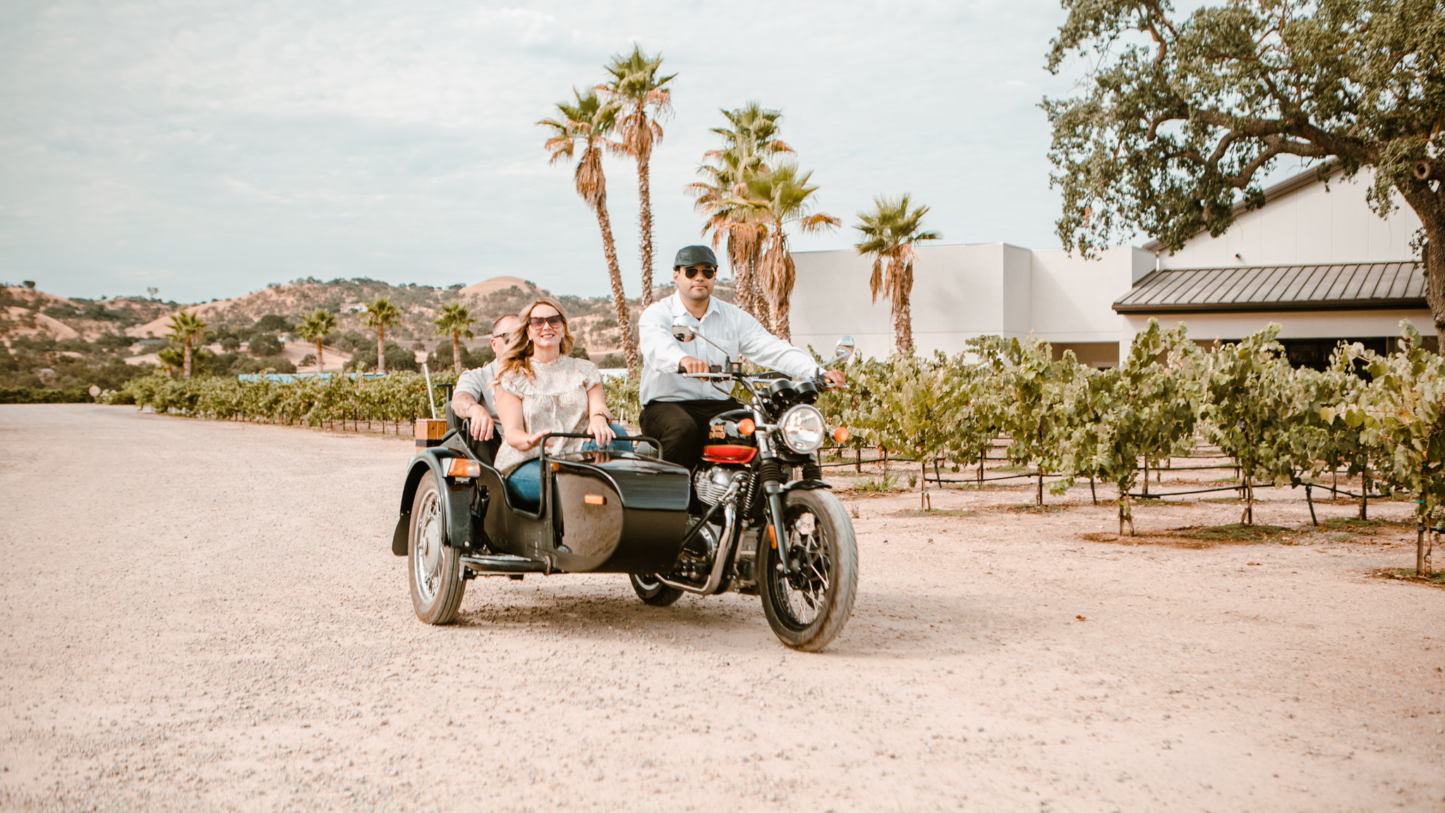 a couple enjoying their tour in wine country